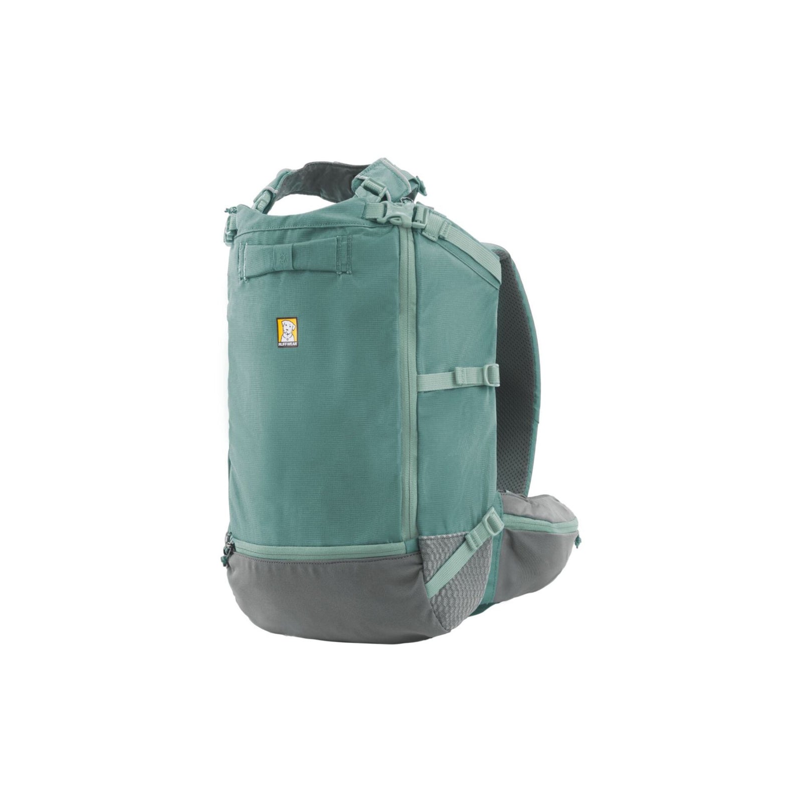Ruffwear Hitch Hiker dog backpack carrier in River Rock Green on a white background, shown from the side, displaying the grab handle, dual locking zippers, cinch straps, and air mesh side panels at the base