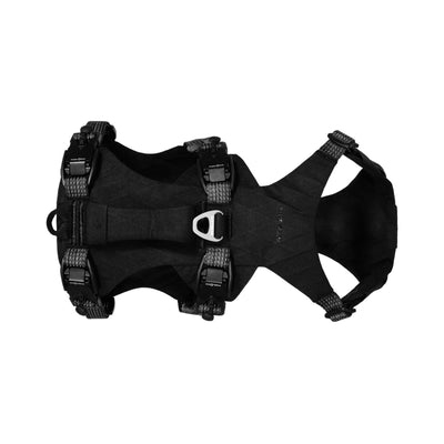 Ruffwear Ridgeline dog harness in Obsidian Black, top-down view on white background showing the load-dispersing chest panel, aluminium V-ring leash attachment, and four Fidlock® magnetic buckles
