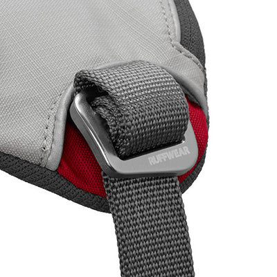 Close-up of the anodized aluminum Doubleback buckle on the Ruffwear Doubleback harness in Cloudburst Gray