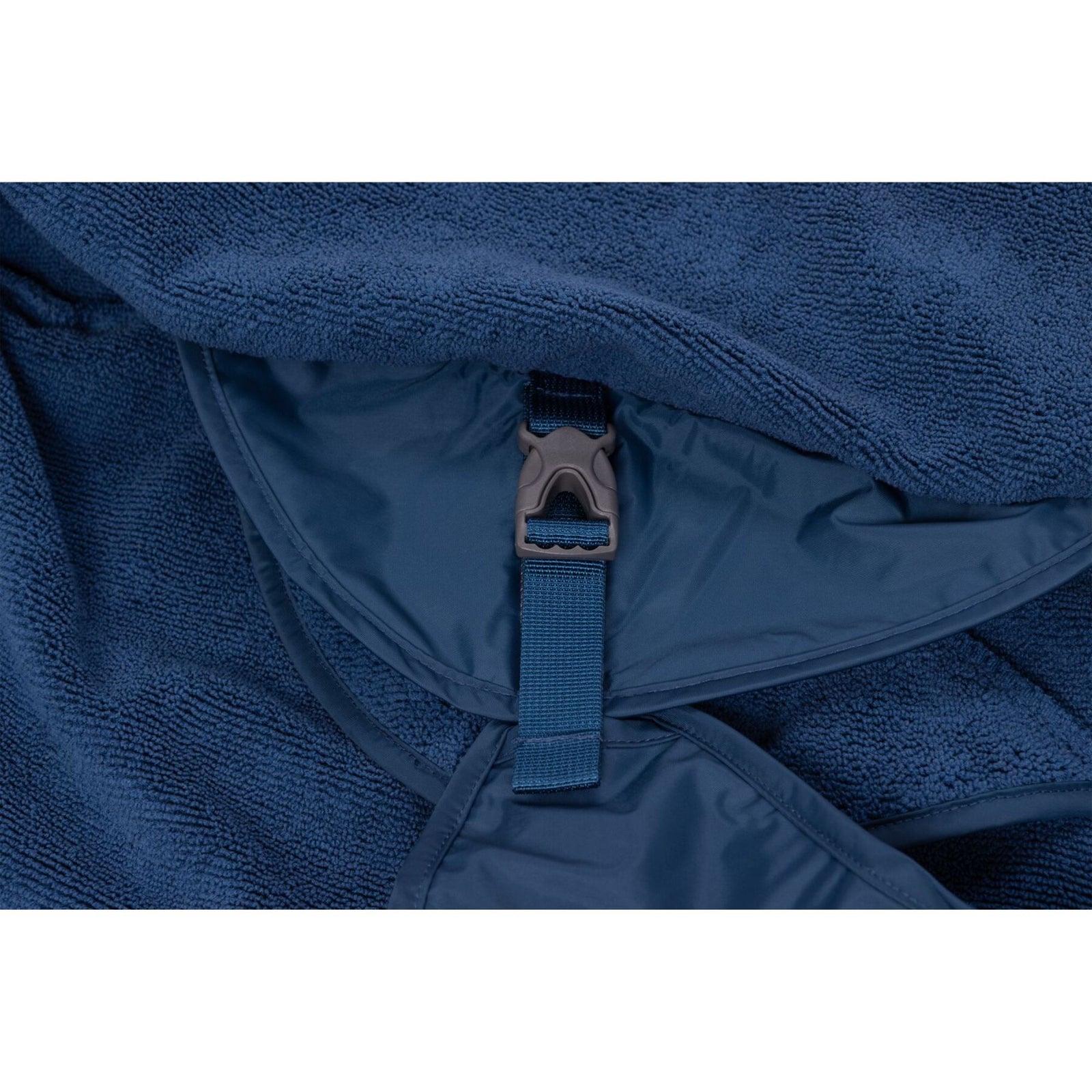 Close-up of the Ruffwear Dirtbag™ Dog Towel showing the navy microfiber lining, waterproof shell, and ITW Waveloc side-release buckle detail