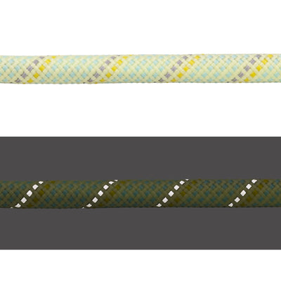Close-up of the Ruffwear Knot-a-Long rope in Moss Green showing the kernmantle weave in daylight (top) and reflective threads illuminated in low light (bottom)