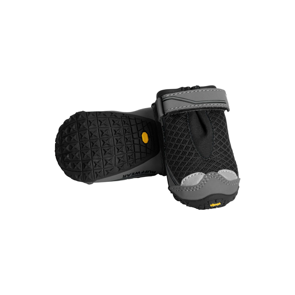 Pair of Ruffwear Grip Trex dog boots in Obsidian Black, one showing the textured Vibram sole and one upright showing the mesh upper, velcro strap, and toe bumper, on white background.