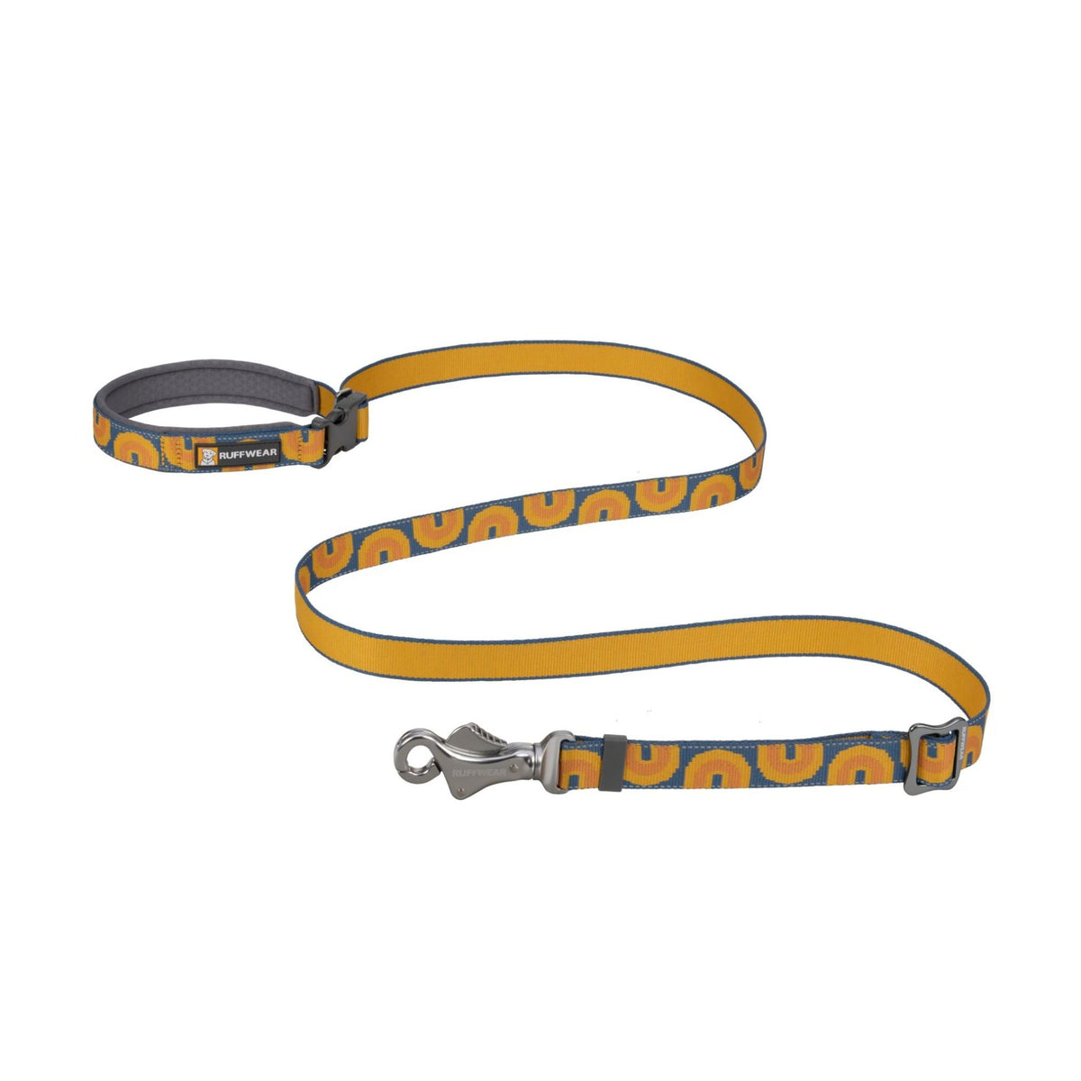 Ruffwear Crag Lead laid flat on a white background in the Lichen print - mustard yellow webbing with a slate blue arch pattern, padded handle, and aluminium snap bolt clip. Canyon Oxbow colourway. Last chance, clearance.