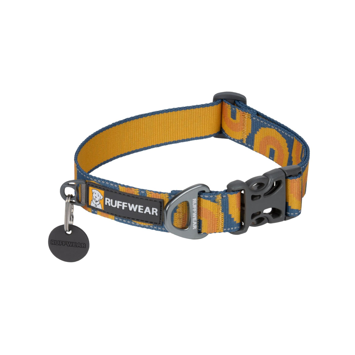 Ruffwear Crag Reflective Dog Collar in Canyon Oxbow — a warm amber and burnt orange pattern with deep blue edging, aluminium V-ring, quick-release buckle and Ruffwear tag.