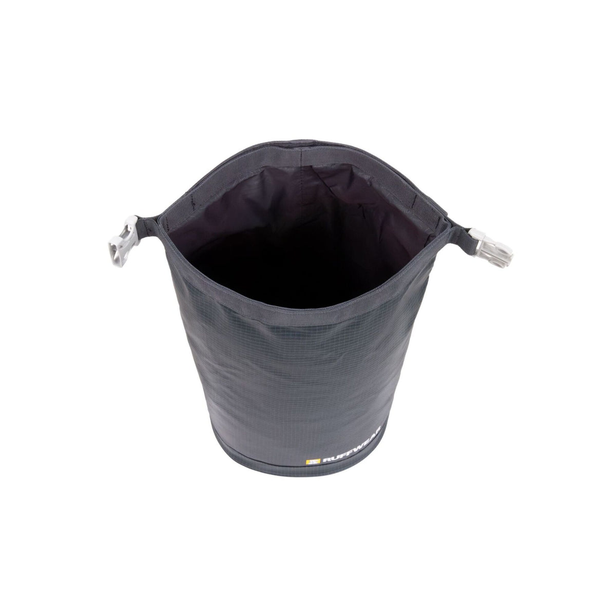 Ruffwear Kibble Kaddie dog food carrier in Basalt Gray on a white background, shown open from above with the roll-down closure unfastened, revealing the empty food-grade waterproof interior lining