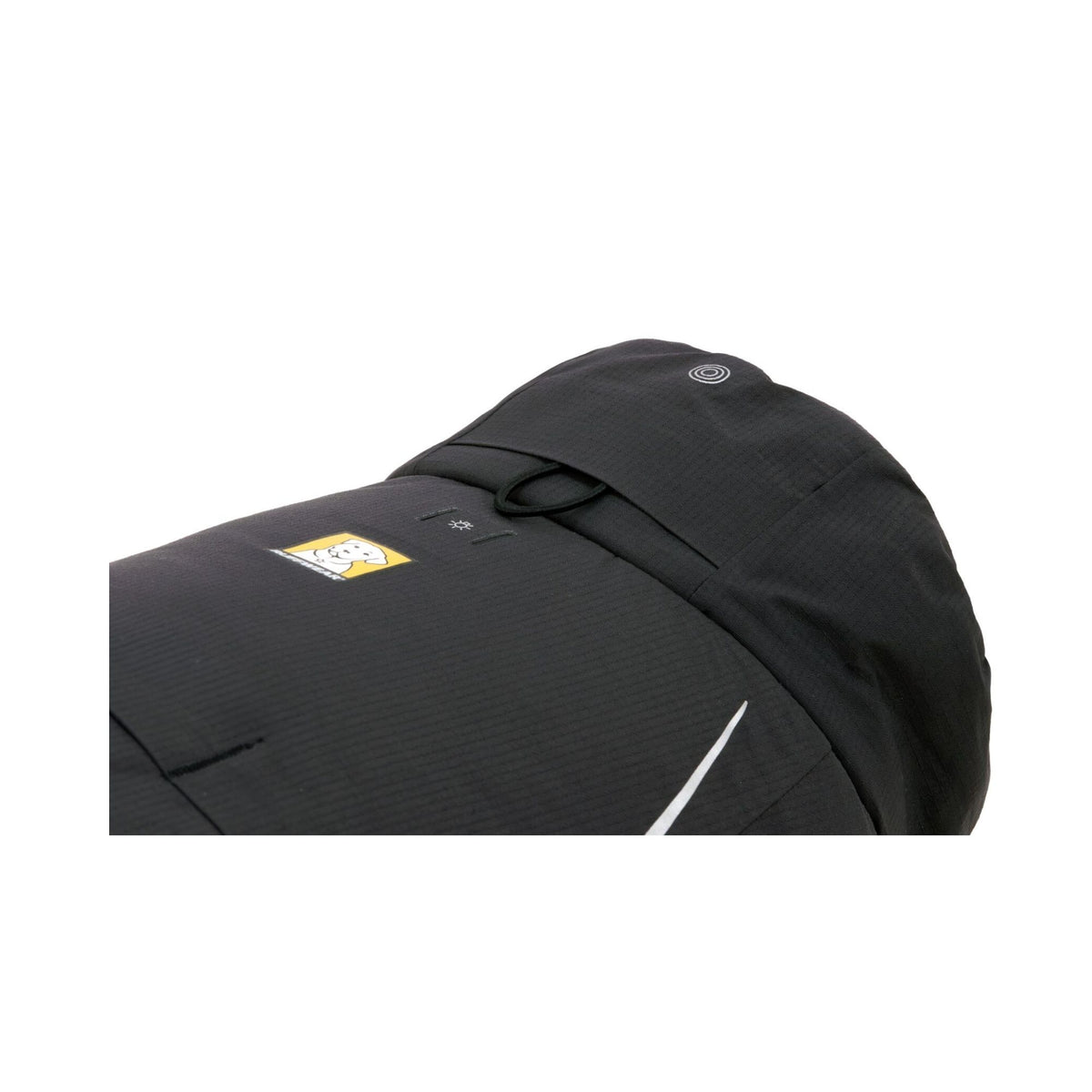 Ruffwear Powder Hound Waterproof Insulated Coverall in Obsidian Black - close-up of the back panel showing the leash portal, Beacon Safety Light attachment loop, bluesign hang tag, and reflective trim detail.