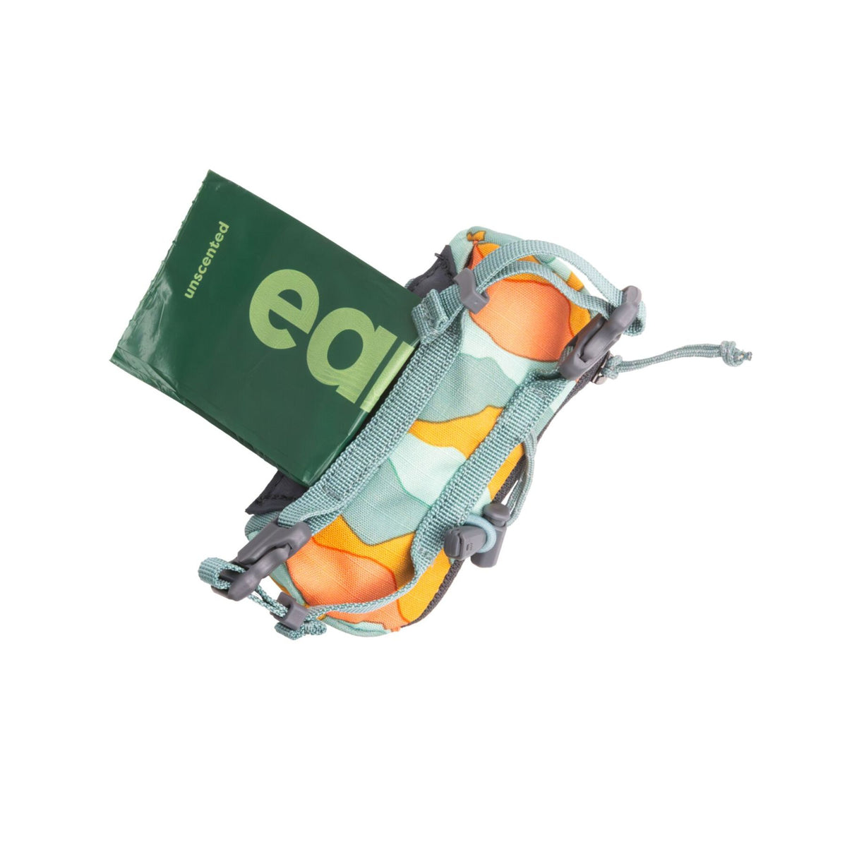 Ruffwear Stash Bag Mini dog waste bag dispenser in Coastal Mountains, angled view showing an Earth Rated unscented pick-up bag dispensing from the side opening, with the buckle straps, cinch cord, and teal and yellow colourway detail visible